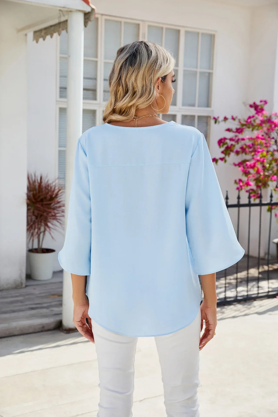 Cara - Blusa elegante con cuello en V